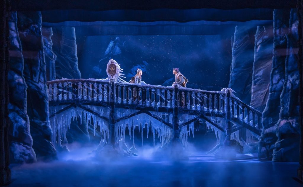 Anna and Kristoff on stage, on the frozen bridge