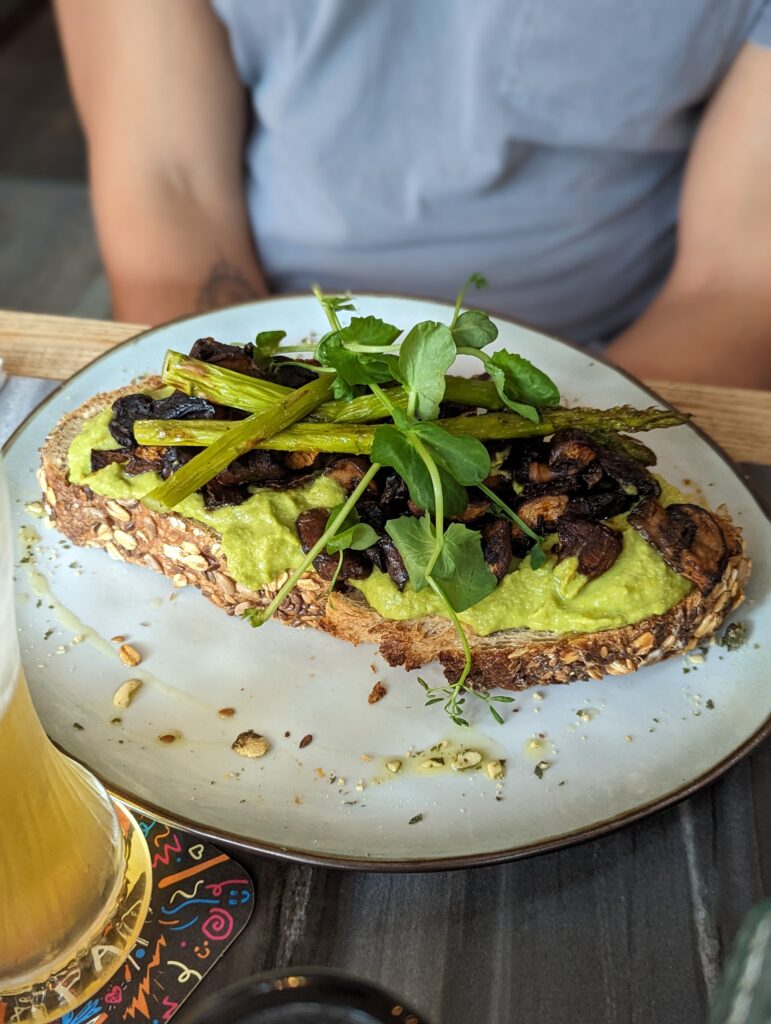 mushrooms on guacamole on toast.